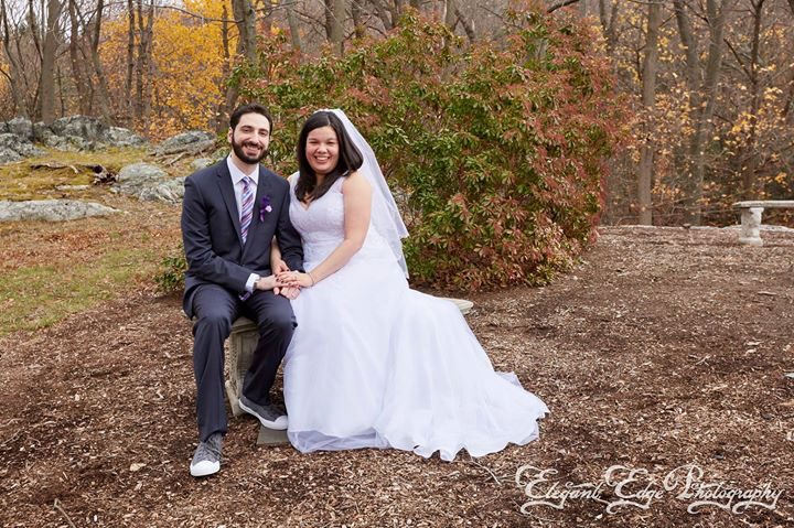 november-wedding-couple-sitting-on-bench