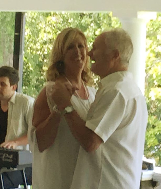 lori and larry dancing on the veranda