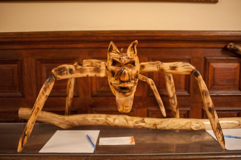 carved wooden spider